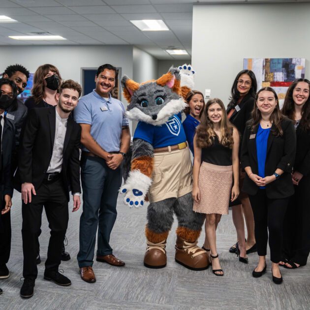 group of student leaders posed with blaze