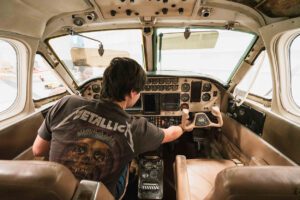 image of aviation student inside plane