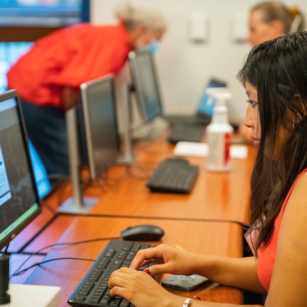 image of student working at computer