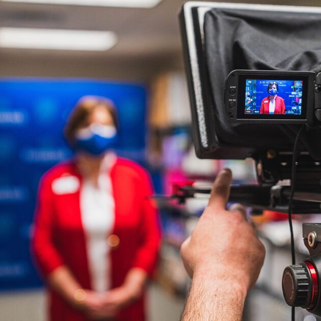 image of a woman getting her picture taken