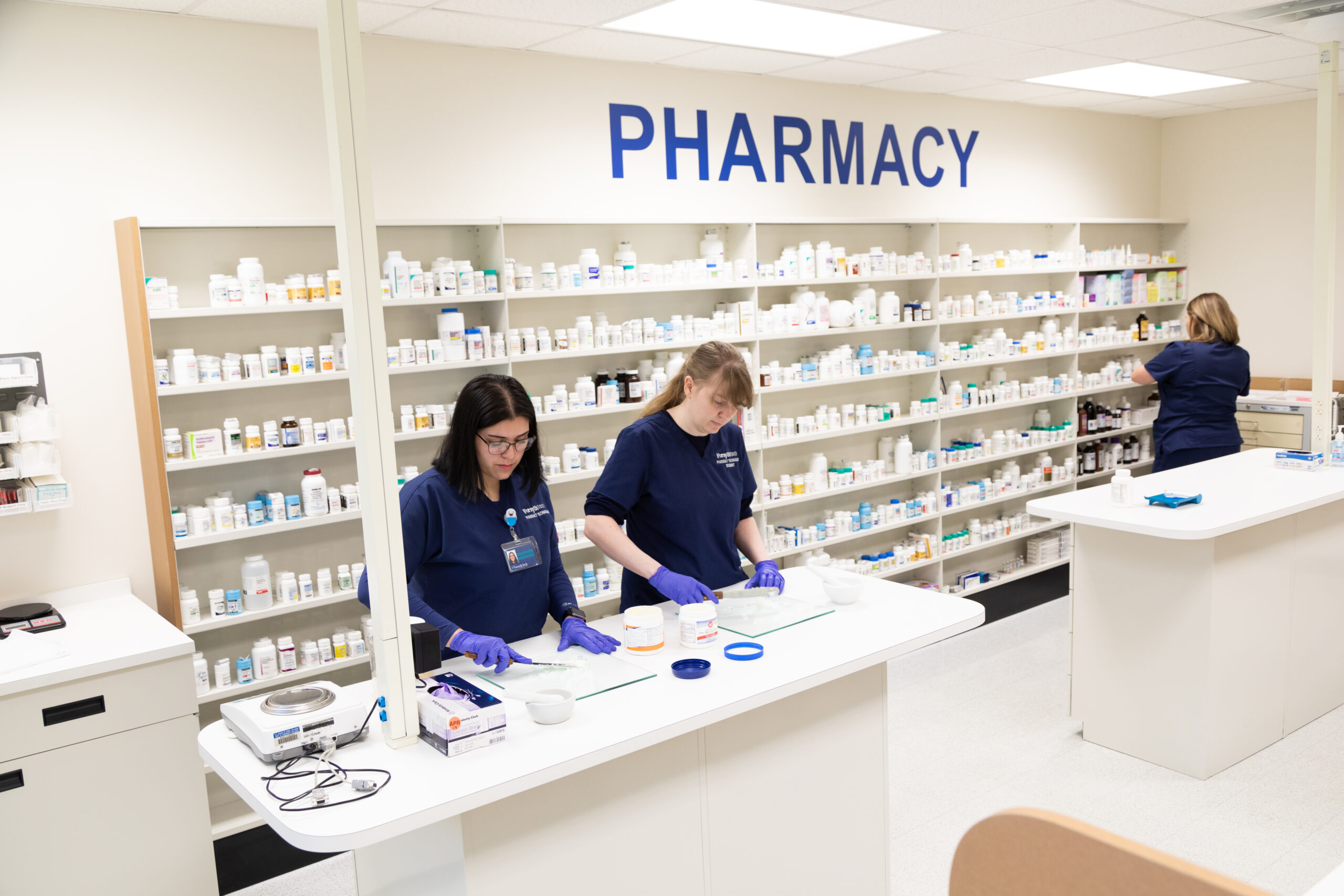 image of students working in pharmacy tech