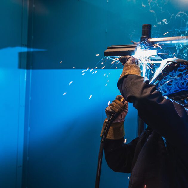 image of student welding