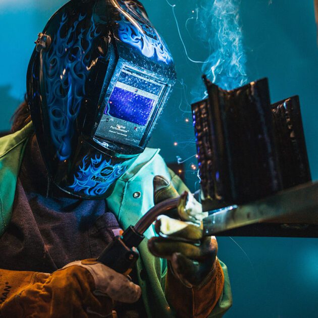 image of student welding