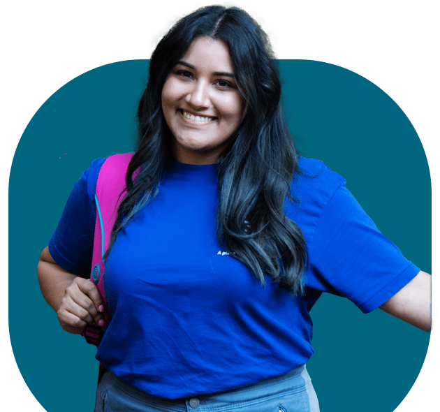 image of female student in front of teal block