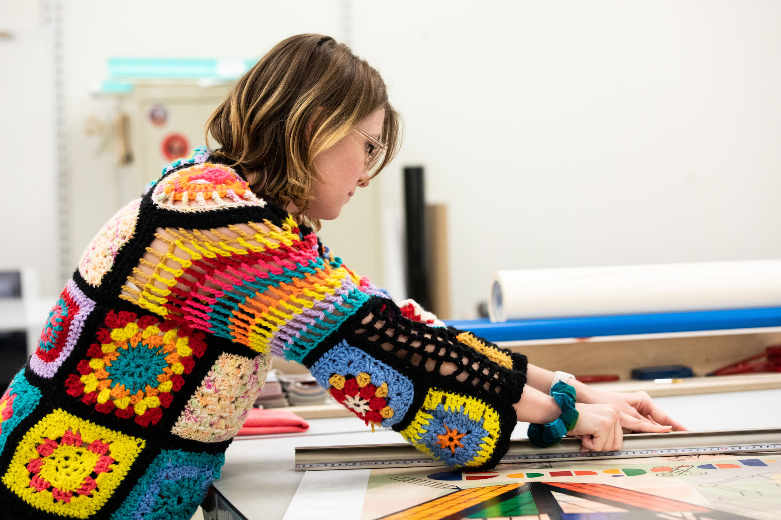 image of a student working in graphic arts