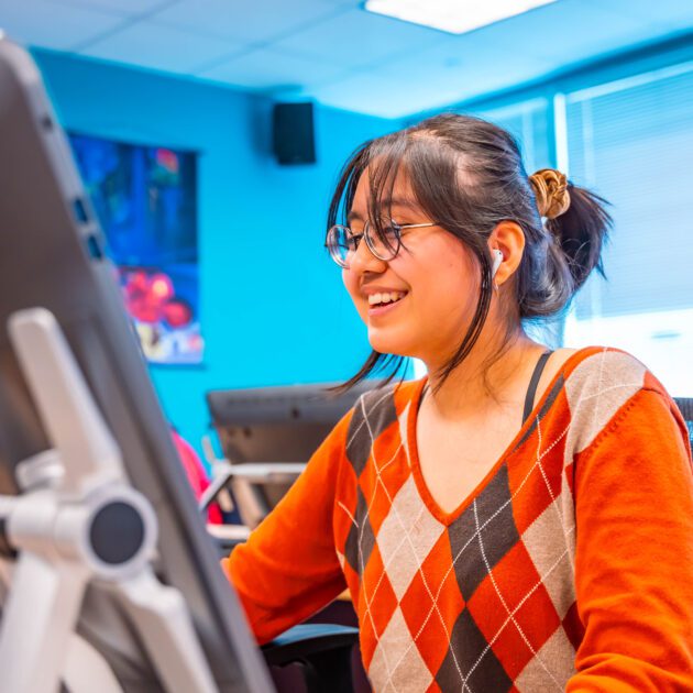 Digital Effects Student at their desk.