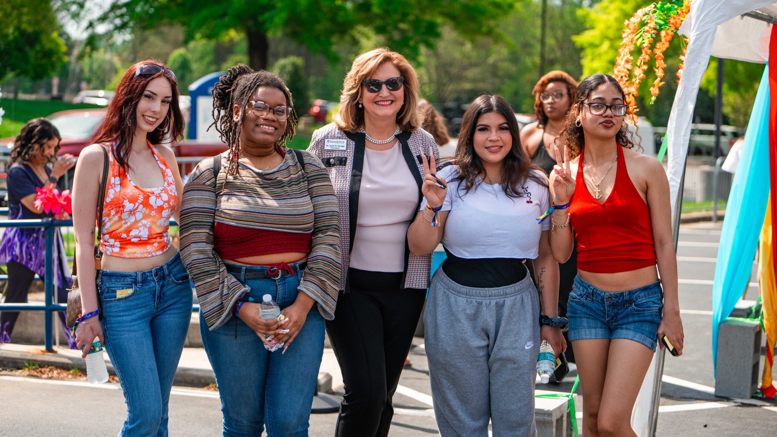 President Spriggs with students at campus event
